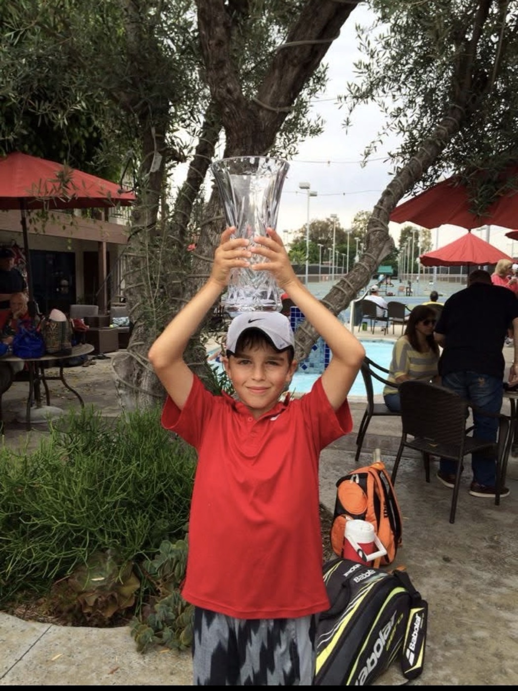 Young Kenan Riz winning Junior Sectionals trophy
